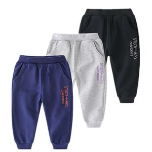 2023 Spring herfst Nieuwe aankomst 2 3 4-10 jaar Kinderkledingbrief Print Pocket Long Sports Casual Pants for Kids Baby Boys L2405