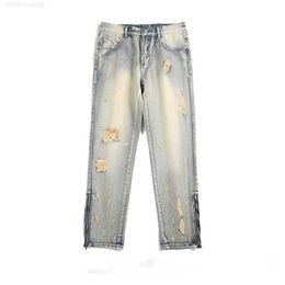 2023 printemps/été High Street jaune boue teint et lavé pantalon tube droit avec trous cassés fermeture éclair marque de mode jean