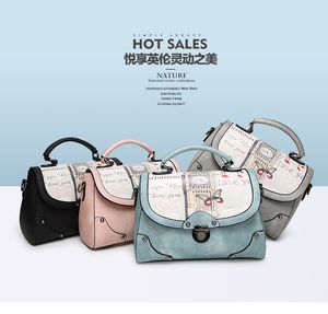 2023 printemps/été nouveaux sacs de soirée givrés pour femmes boucle de verrouillage style rétro sac à main couleur unie polyvalent une épaule Oblique Straddle petit sac en gros