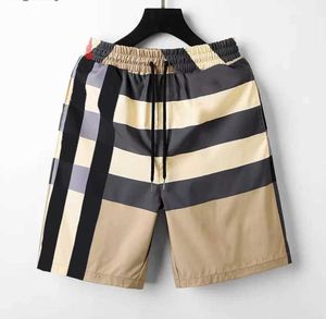 2023 Stripes Hommes Femmes Designers Burberys Shorts Summer Fashion Streetwears Vêtements Séchage rapide SwimWear Printing Board Beach Pants