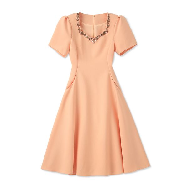 2023 été Orange couleur unie robe à manches courtes col carré genou longueur robes décontractées W3L049510