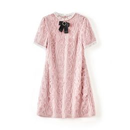 2023 Zomer roze massief kleuren lint stropdas bowknop jurk korte mouw ronde nek paneelpaneel knie-lengte casual jurken w3L043701