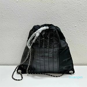 2023 La llegada de la mochila de nailon, bolso de mujer, mochila Wetton, mochila de diseñador, bolso elegante, informal, mochila pequeña para mujer.