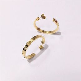 2023 Titanium Steel Gold Hoop Pendiendo para mujer Exquisito Fashion Cing de Diamond Ring Lady Earrings Gift280v