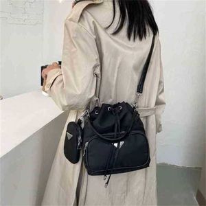 2023 Top Design Luxury Bags tendance de haute qualité et sac à dos en tissu de nylon avec seau personnalité à la mode simple petit