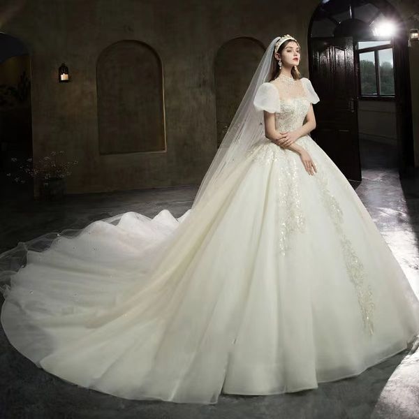 2023 Robes De Mariée En Tulle Elegnat Robes De Mariée Illusion Belle Décolleté A-ligne Appliques Cour Train Robe De Mariee Robe De Mariée Musulmane Sur Mesure