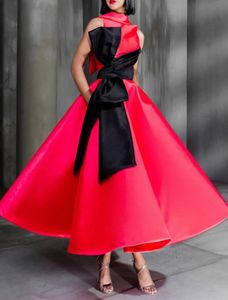 2023 Vintage korte prom -jurken Hoge nek Mouwloze thee lengte baljurk satijn fuchsia zwarte boog satijnen avondjurken feestjurk open terug