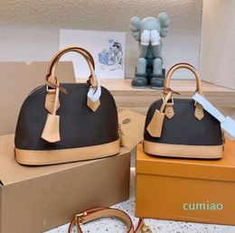 2023 Mujer Crossbody Shell Bolsas Bolsa de diseñador Conchas Bolso Bolso de lujo Bolso de hombro Monederos Smal Mini Totes Impresión de cuero Carta de flores