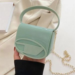 Vrouw meisjes mini schoudertassen ontwerper tas handtas crossbody ketting tas luxurys handtassen zadels portemonnees schattige kleine pvc 5a 2024