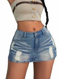 2023 Femmes Fi 90S Vintage Preppy Ripped Slant Pocket Denim Mini Skort Sexy Girl Rave Street Skinny Shorts Mujer 59aT #
