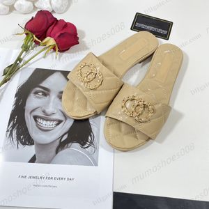 2023 vrouwen zomer sandalen slippers luxe ontwerper flip flops letters camellia echt lederen strand platte parijs casual slippers dia's dia's