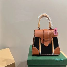 2023 Womens schoudertassen nieuwe designer tas mini mini canvas handtas collage shop split crossbody tas originele handtas geborduurd patroon