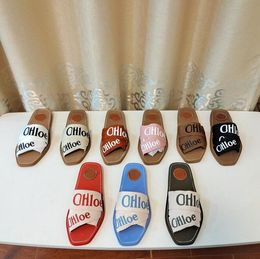 2023 Woody Zapatillas Pisos Zapatillas Mujer Mulas Sandalias Mujer Banda cruzada Lona Señoras Diapositivas Diseñador Chanclas Mujer Diapositivas Pantufles Sandalias con caja 35-42