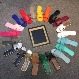 2023 Sandalias de diseñador de moda Sandalias clásicas zapatos de moda de cuero genuino Slip Slipper Flip plano de tacón plano con talla de bolsillo 34-43