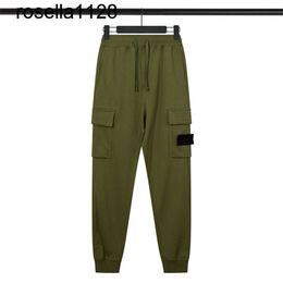 2023ss Pantalones para hombres Insignias de brújula Insignias bordadas Marca de moda Pantalones sanitarios Pantalones casuales para hombres y mujeres para parejas