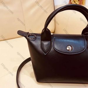 2024 2024 NOUVEAU MIGLE EXQUISITE Cuir Dumpling Sacigner Solid Mini Dames Crossbody Sac Shopping Travel Sac à bandoulière Az