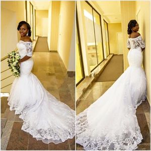 2024 Robes de mariée de sirène bon marché Africain Off épaule Half manches Appliques dentelle Train de chapelle plus taille Robe de mariée formelle Robe Bridal 403