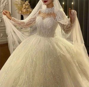 2024 Robe de mariée de luxe Dubaï Dubaï Per perle à manches longues paillettes robes de bal à paille