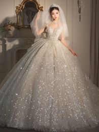 2024 Robes de mariée de robe brillante arabe princesse cristaux transparents à manches longues en dentelle en dentelle