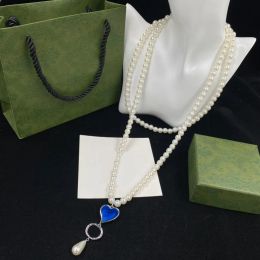 2024 Blue Ocean Heart Pearl Farder Diseñador Mujeres Fashion Collar de lujo Collar Marca Celicial Celebridad del mismo estilo Joya de regalo de bodas de boda de alta calidad Bridal