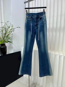 Gratis Verzending 2024 Blauwe Rechte Losse Knoppen Riem Vrouwen Jeans Designer Vrouwen Denim Broek 31734