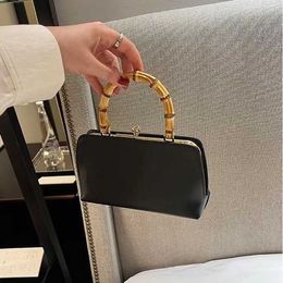 2024 COWIDE Small Gold Mouth Mouth Sac Design Bamboo Joint Sac à main Texture haut de gamme féminine Luxury Luxury Femme Véritine en cuir 240410