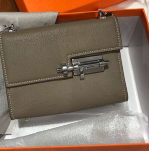 2024 Cowskin 18cm Designer Bolt Sac de mode Sacs épaule femme Lady Geatic Leather Handbag Factory Wholesale Nouveau