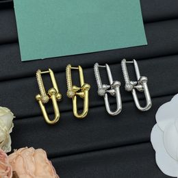 2024 Design high-end sense stud oorbellen voor vrouwen asymmetrische metalen brief warring licht luxe aocialiet zware industrie oorbellen nieuwe vrouwelijke zilveren sieraden