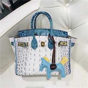 2024 Sac de créateur Cowhide Platinum Foot's Mandbag Fashion Combination Color Crocodile Bone Match Counter Coum Counter 19CS