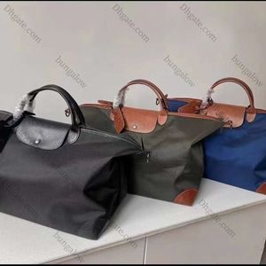 2024 Designer tas hoogwaardige nieuwe boxford stoffen heren en dames casual enkele schouder diagonaal cross short handle draagbare dumpling reistas extra groot