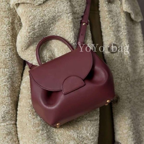 2024 Bolso de diseñador para mujer Bolso bandolera de cuero de vaca con una base que no es fácil de ensuciar Cartera con patrón de lichi