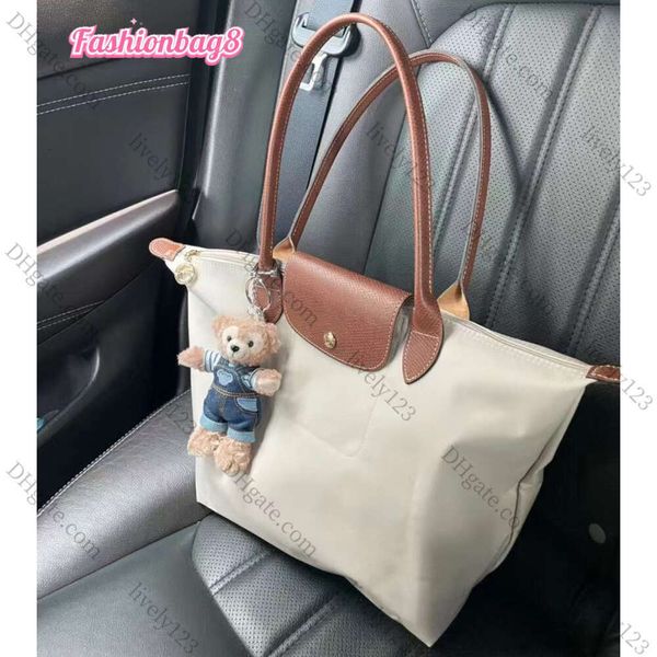 2024 Bolsa de diseñador para mujer Tote Shoulde European Style Leisure Bag Bag Bagballe Nylon Crossbody Bordado Bordado Compras Mini 9025S