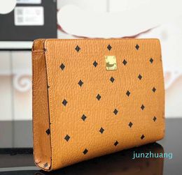 2024 pochette de créateur femmes marron épaule unisexe fermeture éclair en cuir pochette de luxe sacs à bandoulière femme