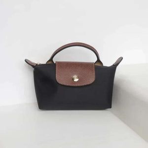 2024 Designer Handbag Ring Automne Automne Volyme Volyding Handbag Fashion Niche Designer Sac Casual Bags Sacs et sacs à main Sacs de créateurs