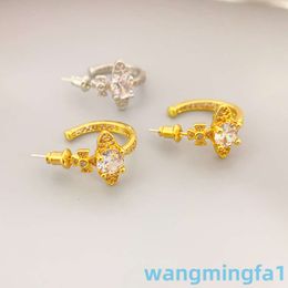 2024 Designer Luxury Xitai Queenjewellery Stud français avec des diamants à cloued Saturne à la mode 925 aiguilles en argent boules d'oreilles de style simple et cool