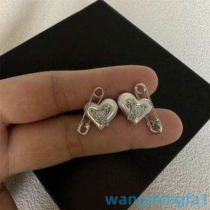 2024 Designer Luxury Xitai Queenjewellery Xis Love Pearl Pins Boucles d'oreilles Saturne Copper Gold Advanced Silver Needle