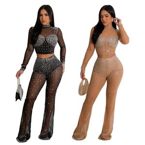 2024 Diseñador Sexy Mesh Diamonds Pack Spack Spay Sets Dos piezas Sets de manga larga Ajustos transparentes Sexy Top and Pants See a través de Club Wear Wholesale Clothing 10453