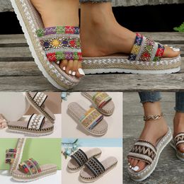 2024 Diapositivas de diseñador Zapatos planos de verano para mujer Conjunto de cuerda de cáñamo Pie Playa Mula Sandalias Al aire libre Todo fósforo Mujeres Zapatillas Mulas Sandalias de mujer de gran tamaño