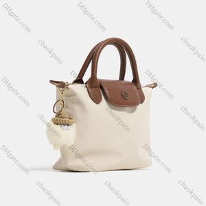 2024 Designer Trendy Couleurs contrastées Sacs à main Petites femmes Poignées de luxe Épaule Bandoulière Sacs latéraux Femmes Casual Polyvalent Totes