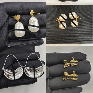 2024 Ear Stud Mujeres CELI 18K Pendiente chapado en oro Marca de lujo Diseñadores Carta Exagerar Perlas clásicas Forma de carambola Pendientes collar Joyería del banquete de boda