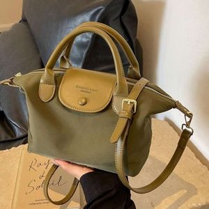 2024 Début de printemps Nouveau Crossbody Dumpling Sac Femme Mobile Phone Mobile Nylon Léger et ordinateur de poche polyvalent longxiang2209