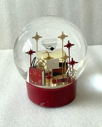 2024 Edición C Clásicos Globo de nieve navideño rojo con botella de perfume dentro de una bola de cristal para cumpleaños especial Novedad Regalo VIP Popular Venta como diseñador de hot cakes