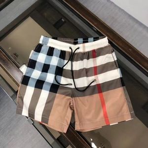 2024 Europees station trendy merk zomerpaar elastische casual strand shorts volledige afdrukken geruite streep print unisex