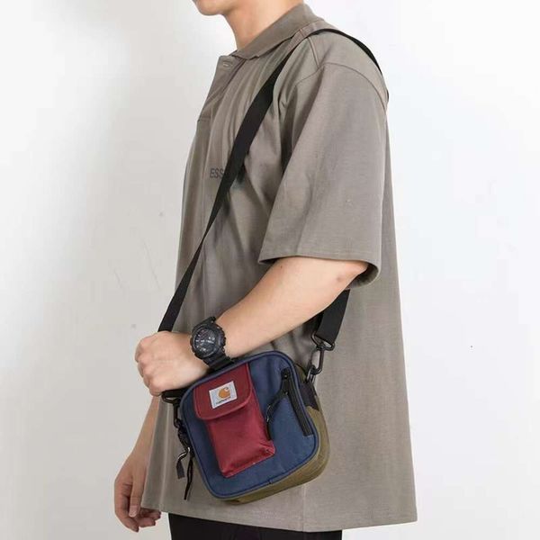 2024 Bolsos de moda Bolso bandolera para hombre con carrito de moda Deportes al aire libre Satchel de nailon Bolso de diseñador de empresa Contáctenos para ver la imagen original