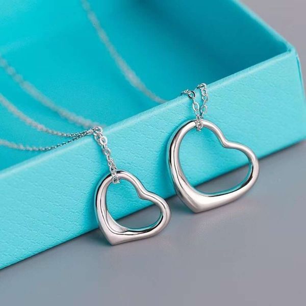 2024 Diseñador de joyería de moda Tiffanyitss Collares pendientes Collar Clásico Hueco Corazón S925 Plata esterlina Joyería de amor para mujer con caja Nxxg