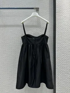 2024 Moda de lujo de verano para mujer Vestidos ahuecados Diseño de marca Vestido sin mangas Señora Casual Vestido negro Diseñador Vestido elegante femenino