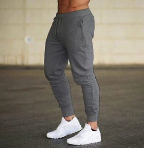 2024 Fashion Men Gyms Pant de couleurs purs joggeurs Fitness Pantalon décontracté Long Men Workout Skinny Papant Pantalon Jogger Pantalon de survêtement 240506