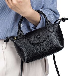 2024 tendance de mode Crossbody Dumplings Designer Handbag Femmes Généralités en cuir décontracté vintage carré épaule Messenger Sac Téléphone 10a
