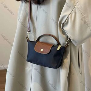 2024 opvouwbare dumplings tassen nylon mini -tas tas geborduurde paardenschoudertassen crossbody tassen dames forens boodschappentassen