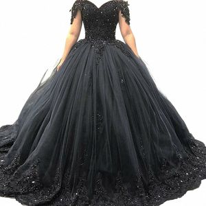 2024 Gothic Crystals Wedding Black Dres Lace Appliques Ball Ball Gown Glitter prince Bridal Robes de l'épaule D6OK #